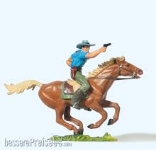 Preiser 54819 - 1:25 Cowboy, reitend m. Rev.