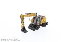Diecast Masters 85956 - Caterpillar M318 Mobilbagger mit extra Werkzeug