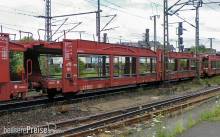 Arnold HN9770 - STVA, 3-achs. Autotransportwagen Laes TA 370 M, rot mit „STVA”-Logo