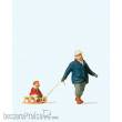 Preiser 28078 - HO Mann mit Kind a. Schlitten