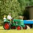 Busch 40072 - Traktor Kramer KL 11 mit Bauer und Kind