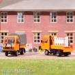 Busch 42253 - Multicar M26 mit Pritsche/Plane, Orange