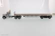 Diecast Masters 71041 - International HX520 Tandem + Flatbed Trailer Zugmaschine + Auflieger - Grau
