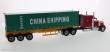 Diecast Masters 71045 - International Lonestar Day Cab w. 40Ft Container Zugmaschine rot + Auflieger in gelb mit China Shipping Container