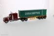Diecast Masters 71045 - International Lonestar Day Cab w. 40Ft Container Zugmaschine rot + Auflieger in gelb mit China Shipping Container
