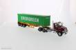 Diecast Masters 71049 - Western Star 4700SB Tandem w. 40Ft Container Zugmaschine + Auflieger - Rot mit gelber Auflieger und 40Ft Evergreen Container