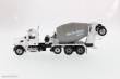 Diecast Masters 71074 - Peterbilt 567 McNeilus Bridgemaster concrete mixer Zementmischer mit roter Kabine und weißer Mischer
