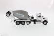 Diecast Masters 71074 - Peterbilt 567 McNeilus Bridgemaster concrete mixer Zementmischer mit roter Kabine und weißer Mischer