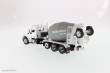 Diecast Masters 71074 - Peterbilt 567 McNeilus Bridgemaster concrete mixer Zementmischer mit roter Kabine und weißer Mischer