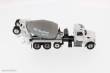 Diecast Masters 71074 - Peterbilt 567 McNeilus Bridgemaster concrete mixer Zementmischer mit roter Kabine und weißer Mischer