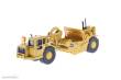 Diecast Masters 85134 - Caterpillar 627G Schürfzug
