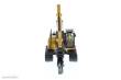 Diecast Masters 85652 - Caterpillar 320D L Bagger mit extra Werkzeuge