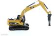 Diecast Masters 85652 - Caterpillar 320D L Bagger mit extra Werkzeuge