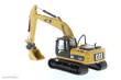 Diecast Masters 85652 - Caterpillar 320D L Bagger mit extra Werkzeuge