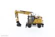 Diecast Masters 85956 - Caterpillar M318 Mobilbagger mit extra Werkzeug