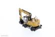 Diecast Masters 85956 - Caterpillar M318 Mobilbagger mit extra Werkzeug