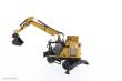 Diecast Masters 85956 - Caterpillar M318 Mobilbagger mit extra Werkzeug