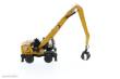 Diecast Masters 85958 - Caterpillar MH3040 Umschlagsbagger