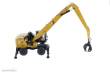 Diecast Masters 85958 - Caterpillar MH3040 Umschlagsbagger