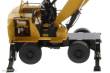 Diecast Masters 85958 - Caterpillar MH3040 Umschlagsbagger